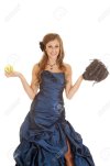 15001980-a-teen-girl-in-her-blue-formal-dress-holding-up-a-softball-and-a-mit.jpg